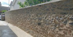 Refection d’un mur en pierres à Limoges